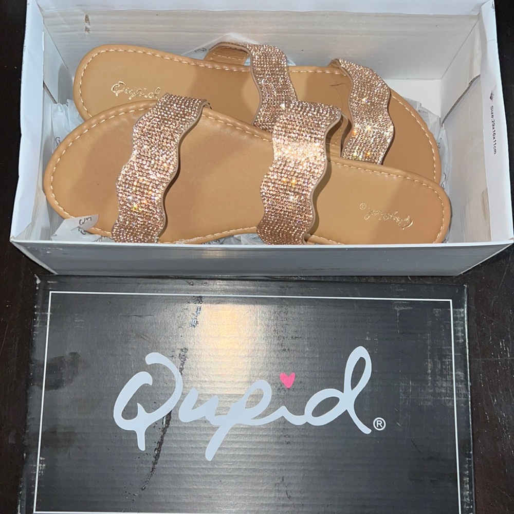 Brand new never worn sandal. Size 9